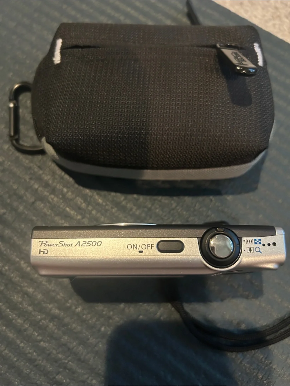 Canon Compact Digital Camera in Black and Silver with Wrist Strap and Case